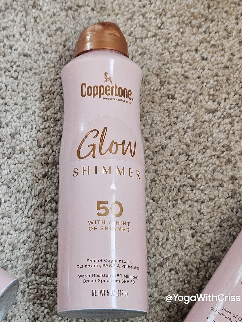 SPF 50 Glow Shimmer Coppertone broad spectrum sunscreen spray